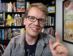 Green addressing the camera in a 2016 Vlogbrothers video Hank Green Vlogbrothers 2016.jpg