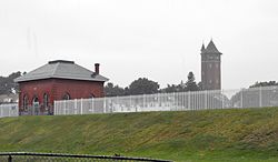 High Service Water Tower (1896), also called Tower Hill Water Tower, a notable eyecatcher or folly, named an American Water Landmark in 1979 by the American Water Works Association.