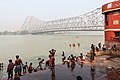 Bridges are a common way of crossing rivers. (Hooghly River, Kolkata, India)