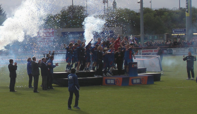 The team celebrating winning the First Division title in May 2010 at the Caledonian Stadium.