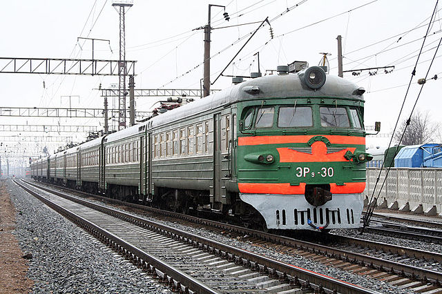 Green-and-orange electrified train