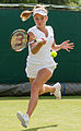 Katie Swan competing in the second round of the 2015 Wimbledon Qualifying Tournament at the Bank of England Sports Grounds in Roehampton, England. The winners of three rounds of competition qualify for the main draw of Wimbledon the following week.