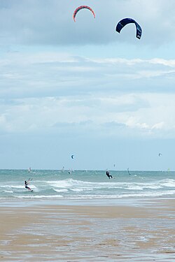 Kite surfers and wind surfers