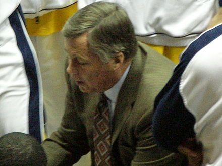 Montgomery huddles with his players in December 2008