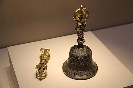 Chinese five-pronged vajra and ghanta (ritual bell), made during the Xuande period of the Ming dynasty. In Chinese Buddhism, these instruments are usually utilized during esoteric rituals that incorporate tantric elements, such as the Grand Mengshan Food Bestowal ceremony (蒙山施食), the Yogacara Flaming Mouth ceremony (瑜伽焰口法會) and the Liberation Rite of Water and Land (水陸法會).