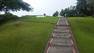 Morne Fortune's Shipley Battery on Fort Charlotte, with the grave of Derek Walcott, and the Inniskilling Monument Morne Fortune's Shipley Battery on Fort Charlotte with the grave of Derek Walcott and the Inniskilling Monument.jpg