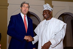 Nigerian President Jonathan Greets Secretary Kerry Upon Arrival At State House in Lagos for Election Conversation (16177696837).jpg