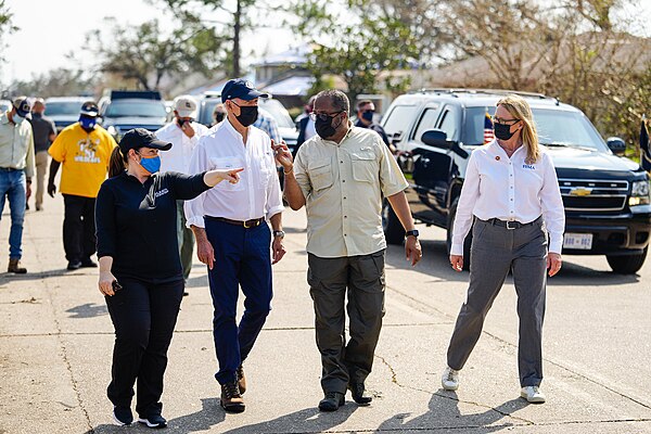 Carter with President Biden surveying damage from Hurricane Ida