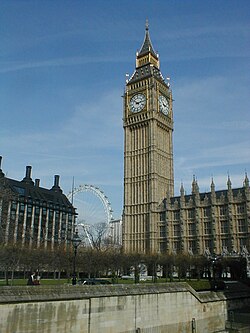 Portcullis House (L) and the Palace of Westminster (R), with the London Eye visible in the background. Parliament with Millennium Wheel in Background.jpg