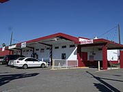 This is the building where in 1944, Gordon Fritch established his Gordon Fritch Cafe. The cafe, which was a popular place among Phoenix's African Americans, is located at 1602 East Jefferson Street. Later, Reddey's Corner was established. "Reddey's Corner" was the oldest Drive-in Liquor Store in Phoenix. It is listed on the African American Historic Property Survey.