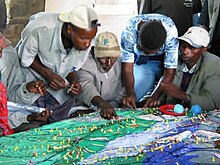 Ogiek Peoples visualising their traditional spatial knowledge on a 1:10,000 scale participatory 3D model, Nessuit, Mau Forest Complex, Kenya Pic 367 nessuit.JPG