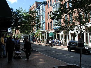 Exchange Street, in the Old Port, viewed from the bottom of its hill, during the height of the summer tourist season. PortlandME ExchangeSt.jpg