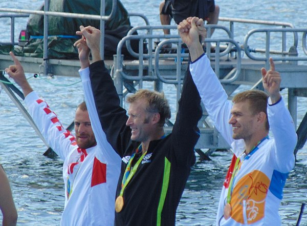 The medallists: Damir Martin, Mahé Drysdale, and Ondřej Synek