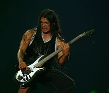 Robert Trujillo performing with Metallica in 2009. The film documents his audition with Metallica and hiring into the band. Robert Trujillo Madrid 2009.jpg