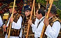 Romanian men with traditional musical instruments.jpg