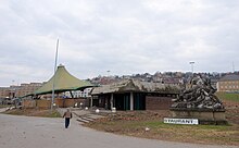 Der Landespavillon (hier im März 2012) lag über dem südlichen Teil des geplanten Hauptbahnhofs und wurde im Zuge der Bauarbeiten im August 2012 abgerissen.