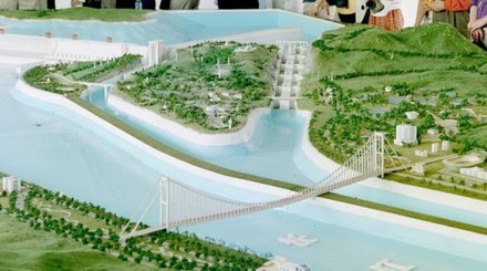 Three Gorges Dam model view. A pair of five locking steps is at center with a ship lift to the left