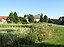 Village pond and church in Görsdorf. Görsdorf is a part of the municipality Tauche in the District Oder-Spree, Brandenburg, Germany.