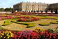 Exterior do Palácio de Versalles, com seus jardins.