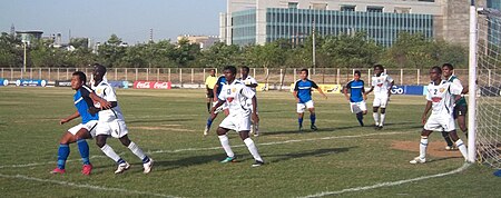 Viva Kerala players (in white) in action during Kerala Premier League in 2011. VivaDefence.jpg