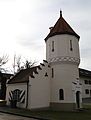 Nähe Hauptstraße; ehemaliges Wasserwerk Harthausen, Wasserbehälter in Form eines mittelalterlichen Wehrturms mit Rundbogenfries und angefügtem kleinem Wasserhaus mit Treppengiebel, bezeichnet mit „1901“. This is a picture of the Bavarian Baudenkmal (cultural heritage monument) with the ID D-1-84-121-5 (Wikidata)