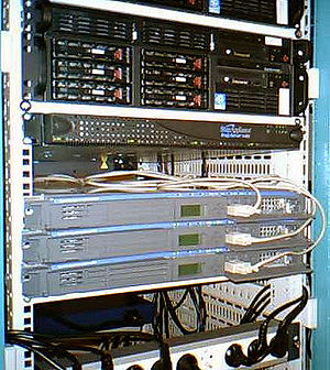 front view of the cluster of Wikimedia servers in Aubervilliers near Paris, France, installed on December 18, 2004; the three 1U servers of the same model (HP Proliant sa1100) in the middle are ours