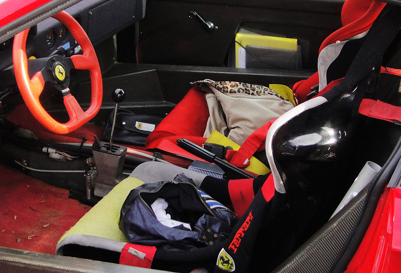 File:" 11 - Ferrari F40 - inusual use of a supercar - woman bags on racing seats.jpg