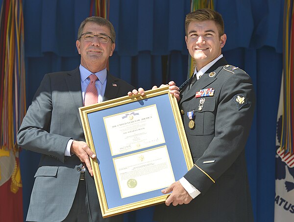 U.S. Secretary of Defense Ash Carter presents the Soldier's Medal to Alek Skarlatos on September 17, 2015.