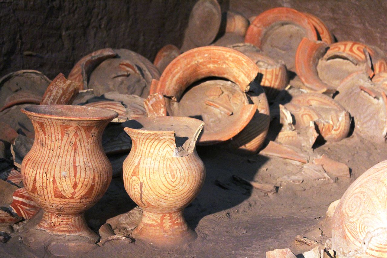 Vase with red and white design.