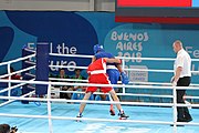 Deutsch: Boxen bei den Olympischen Jugendspielen 2018 Tag 12, 18. Oktober 2018 - Kampf um die Bronzemedaille im Fliegengewicht Mädchen – Timur Merjanow (Usbekistan, rot) schlägt Youssef Ali Karar Ali (Ägypten, blau) 5-0; Ringrichter ist Antonín Gaspar (Tschechien). English: Boxing at the 2018 Summer Youth Olympics on 18 October 2018 – Boy's heavyweight Bronze Medal Bout - Timur Merjanov (Uzbekistan, red) beats Youssef Ali Karar Ali (Egypt, blue) 5-0; Referee is Antonín Gaspar (Czech Republic). Español: Boxeo en los Juegos Olímpicos Juveniles de Verano de 2018 en 18 de octubre de 2018 - Medalla de bronce de peso pesado del muchacho: Timur Merjanov (Uzbekistán, roja) le gana a Youssef Ali Karar Ali (Egipto, azul) 5-0; El árbitro es Antonín Gaspar (Republica checa).