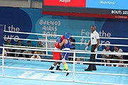 Deutsch: Boxen bei den Olympischen Jugendspielen 2018 Tag 12, 18. Oktober 2018 - Finale Fliegengewicht Mädchen – Martina La Piana (Italien, blau) schlägt Adijat Gbadamosi (Nigeria, rot) 5-0; Ringrichter ist James Beckles (Trinidad und Tobago). English: Boxing at the 2018 Summer Youth Olympics on 18 October 2018 – Girl's flyweight Gold Medal Bout - Martina La Piana (Italy, blue) beats Adijat Gbadamosi (Nigeria, red) 5-0; Referee is James Beckles (Trinidad and Tobago). Español: Boxeo en los Juegos Olímpicos Juveniles de Verano de 2018 en 18 de octubre de 2018 - Combate a medalla de oro de peso mosca para mujeres: Martina La Piana (Italia, azul) le gana a Adijat Gbadamosi (Nigeria, roja) 5-0; El árbitro es James Beckles (Trinidad y Tobago).