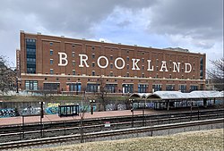 Brookland in 2022 with the Brookland–CUA station Metro station in the foreground