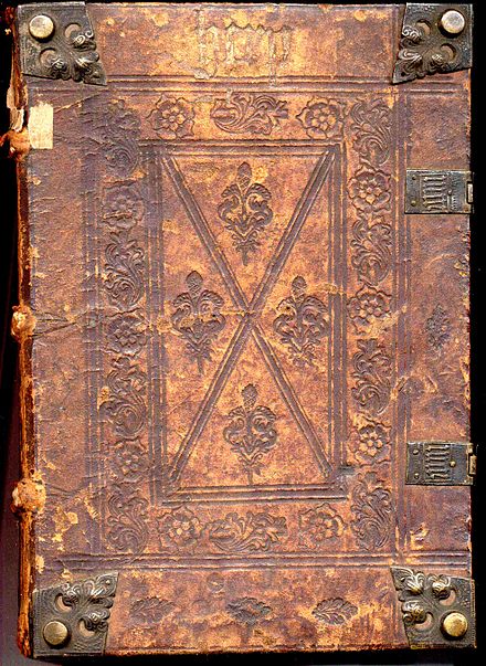 A 15th-century Incunable. Notice the blind-tooled cover, corner bosses, and clasps.