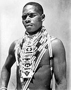 Zulu man with jewellery. Tropenmuseum.