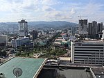 Fuente Osmeña Circle and at the end of point in of Osmeña Boulevard above of them is Cebu Provincial Capitol