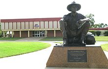 Statue of "The Cunnamulla Fella" erected as a tribute to songwriter Stan Coster and singer Slim Dusty Cunnamulla Fella.JPG