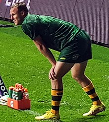 Cherry-Evans warming down for Australia in 2022 DCE Kangaroos.jpg