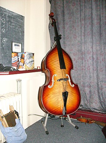 Upright bass used by a bluegrass group; the cable for a piezoelectric pickup can be seen extending from the bridge.