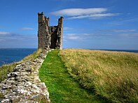 Lilburn Tower of Dunstanburgh Castle, seen from the edge of the outer bailey. Dunstanburgh Castle - geograph.org.uk - 924510.jpg