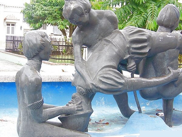 Statue in the main plaza's fountain depicting the drowning of legendary conquistador Diego Salcedo, a story which gives the municipality one of its ma