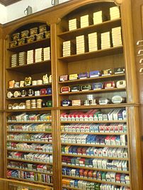 Tobacco display in a store Munich in 2008. In many countries, cigarettes may not be displayed, but must be kept behind the counter.