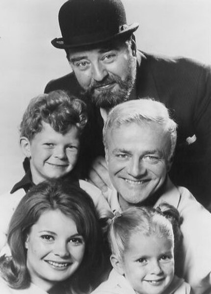 Keith (center right) with Sebastian Cabot (top) and the other costars of Family Affair