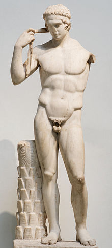The so-called 'Farnese Diadumenos' is a Roman copy of a Greek original attributed to Polykleitos c. 440 BC, depicting an athlete tying a victory ribbon round his head. (Source: Wikimedia)