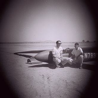 George C. Tweed Jr. with Jack Green and the GT-1 after the first flight at Elsinore, California. The early-style bubble canopy be seen on the ground. GTandJGwithGT-1.jpg