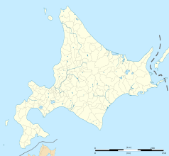 Mapa konturowa Hokkaido, blisko centrum na dole znajduje się punkt z opisem „Obihiro”