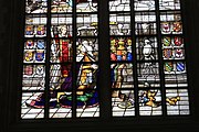 English: Detail of the stained-glass window number 8 in the Sint Janskerk at Gouda, Netherlands: "The punishment of Heliodorus"