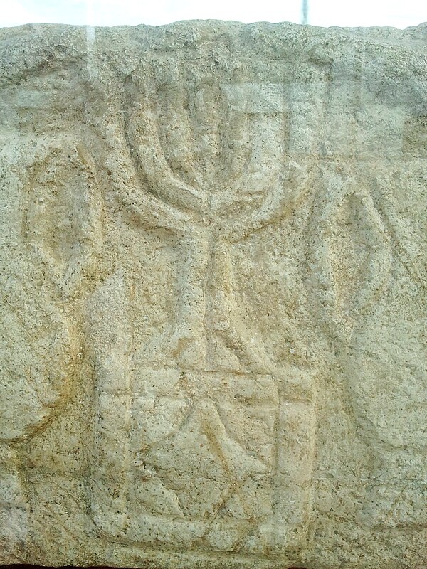 The temple menorah as depicted on the Magdala stone, early 1st century CE