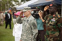 U.S. AFRICOM commander Carter Ham and senior Gambian Army officer Masaneh Kinteh surveying the troops, 21 July 2011 Masaneh Kinteh and Carter Ham saluting.jpg