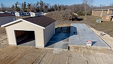 Manufactured home foundation Mobile home with garage and foundation.jpg