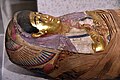 Mummy mask and coffin of one Aline's daughters